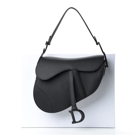 dior matte black saddle bag.